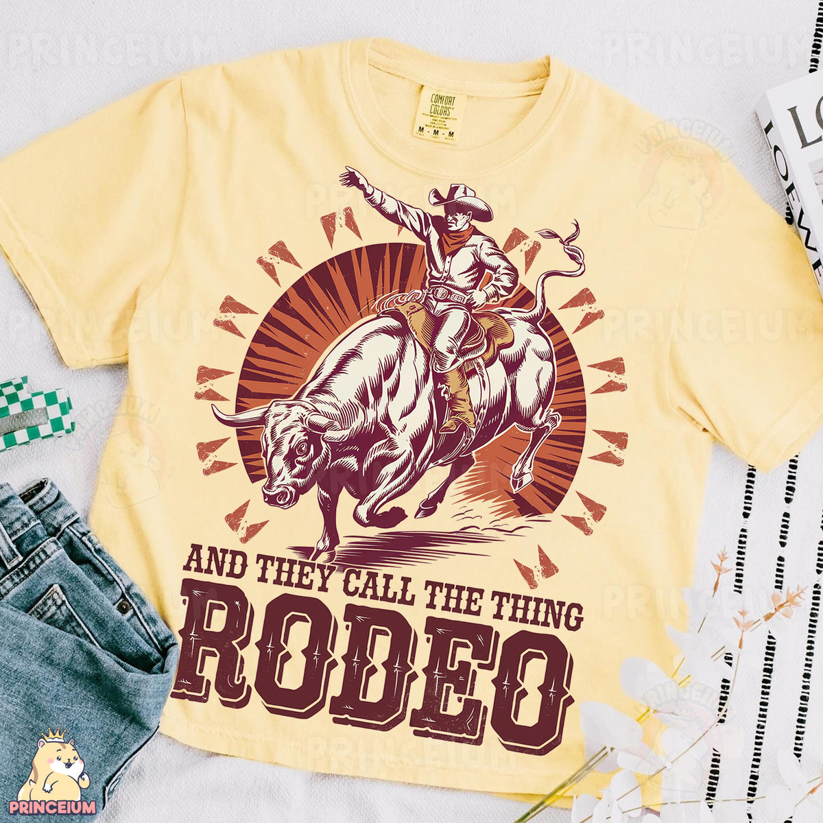 a t - shirt with a cowboy riding a horse