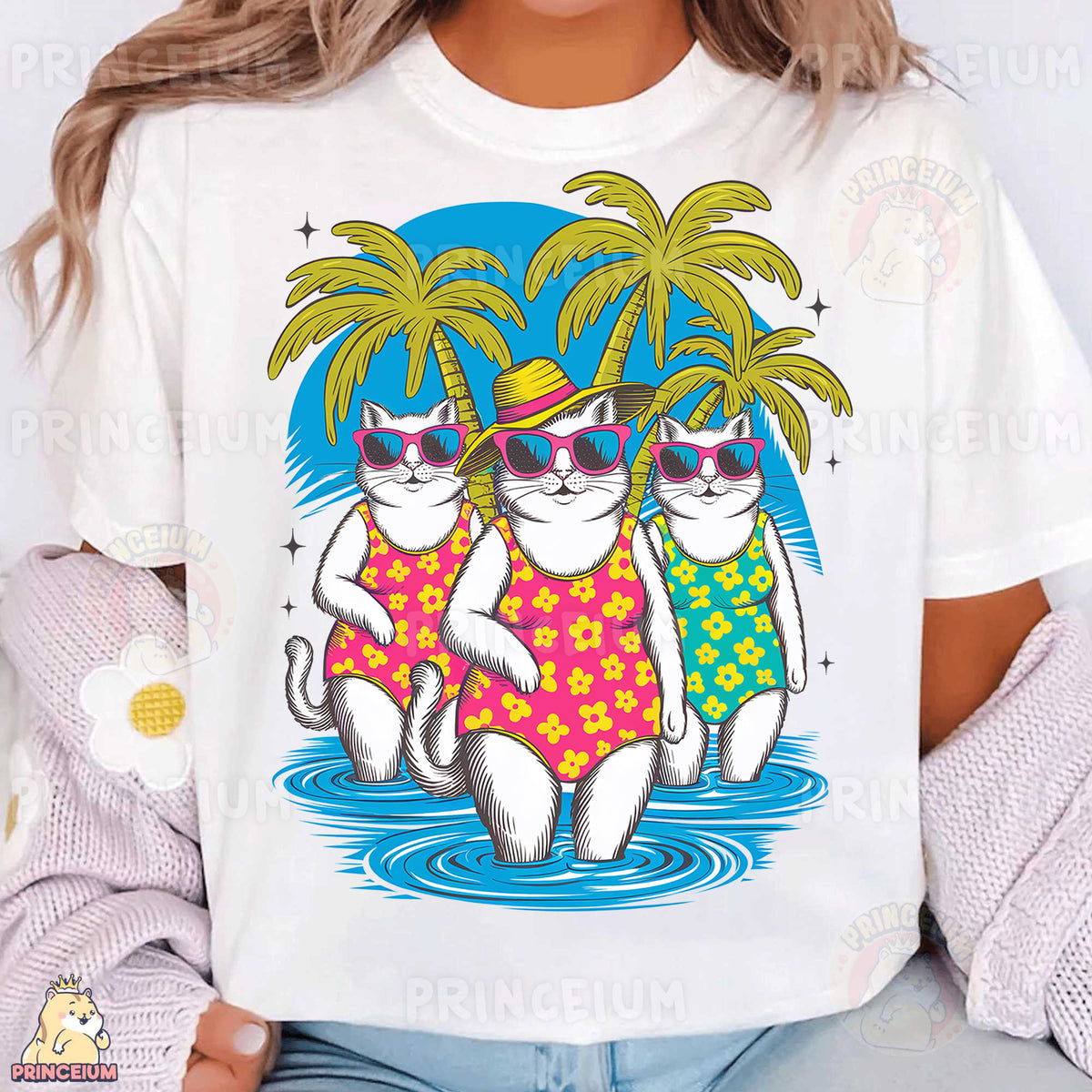 a woman wearing a white t - shirt with two cats on it