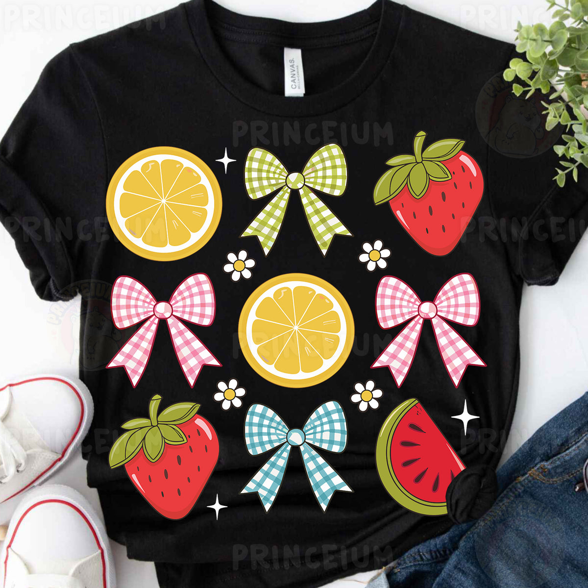 a t - shirt with fruit and bows on it