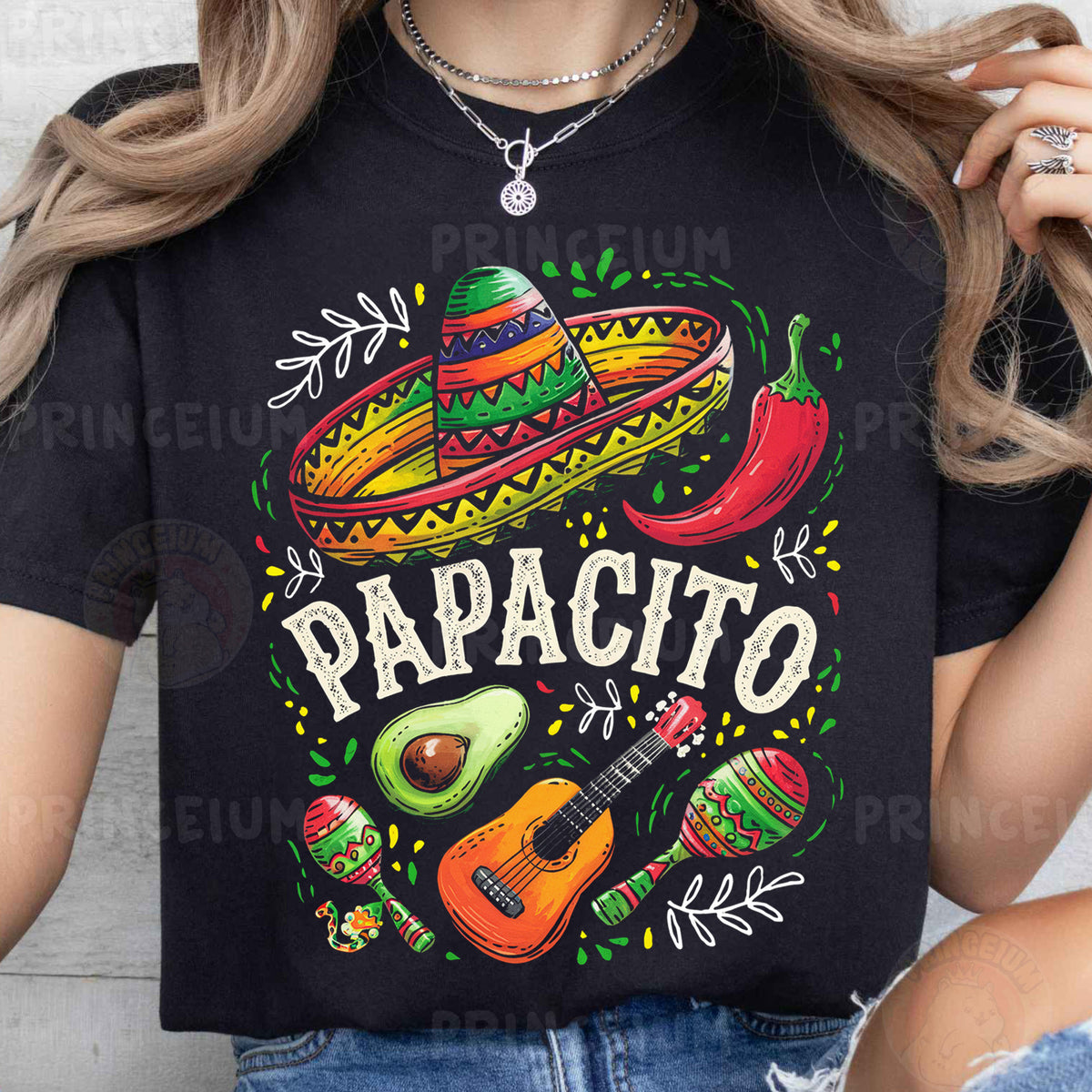 a woman wearing a black t - shirt with a mexican design