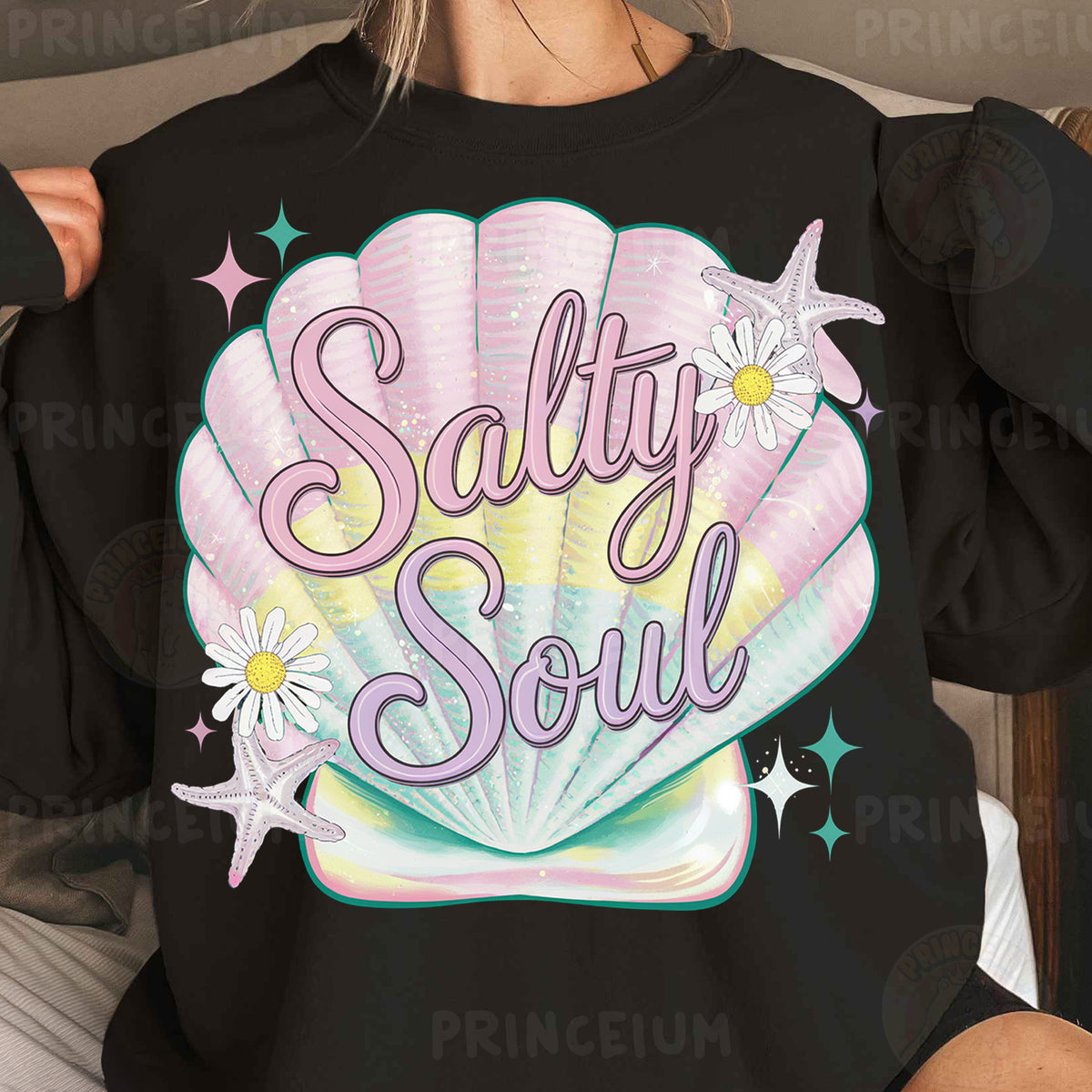 a woman wearing a black shirt that says salty soul