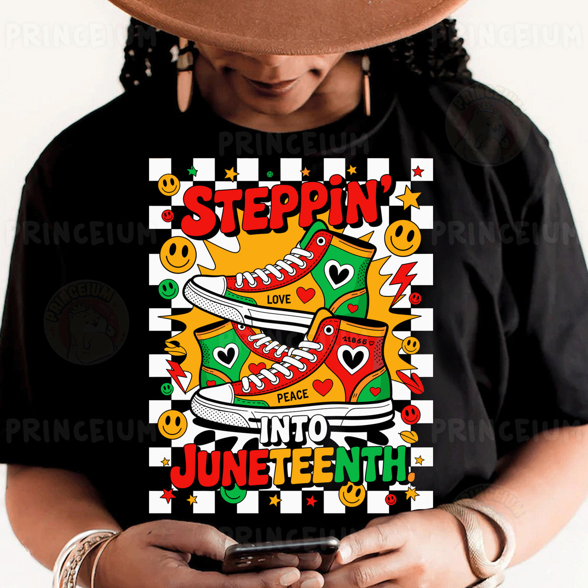 a person wearing a black shirt and a hat holding a cell phone