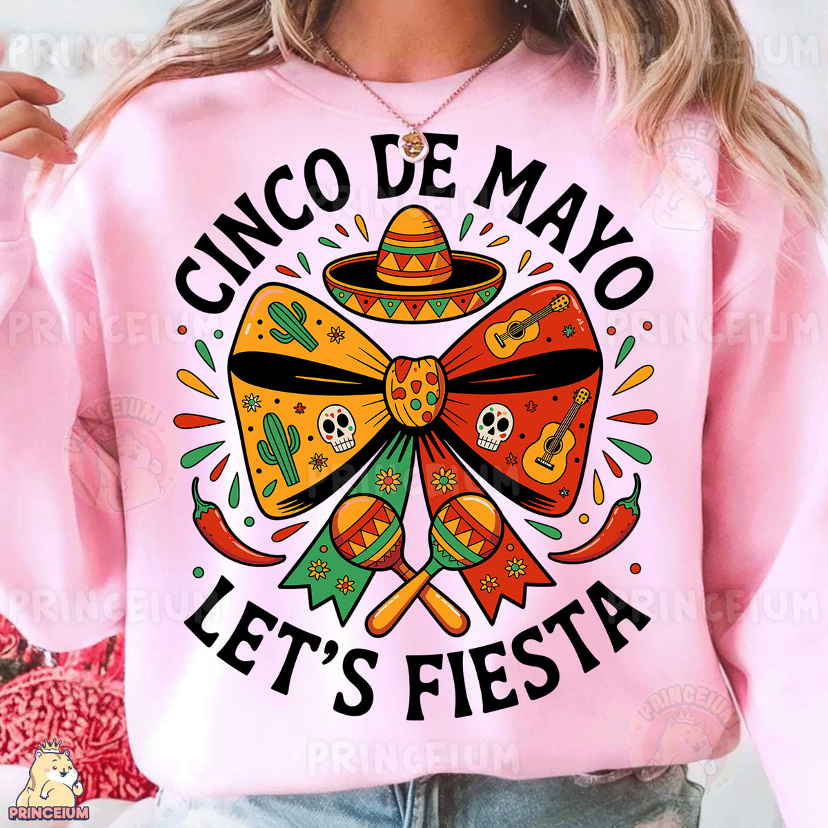 a woman wearing a pink cinco de mayo let's fiesta sweatshirt