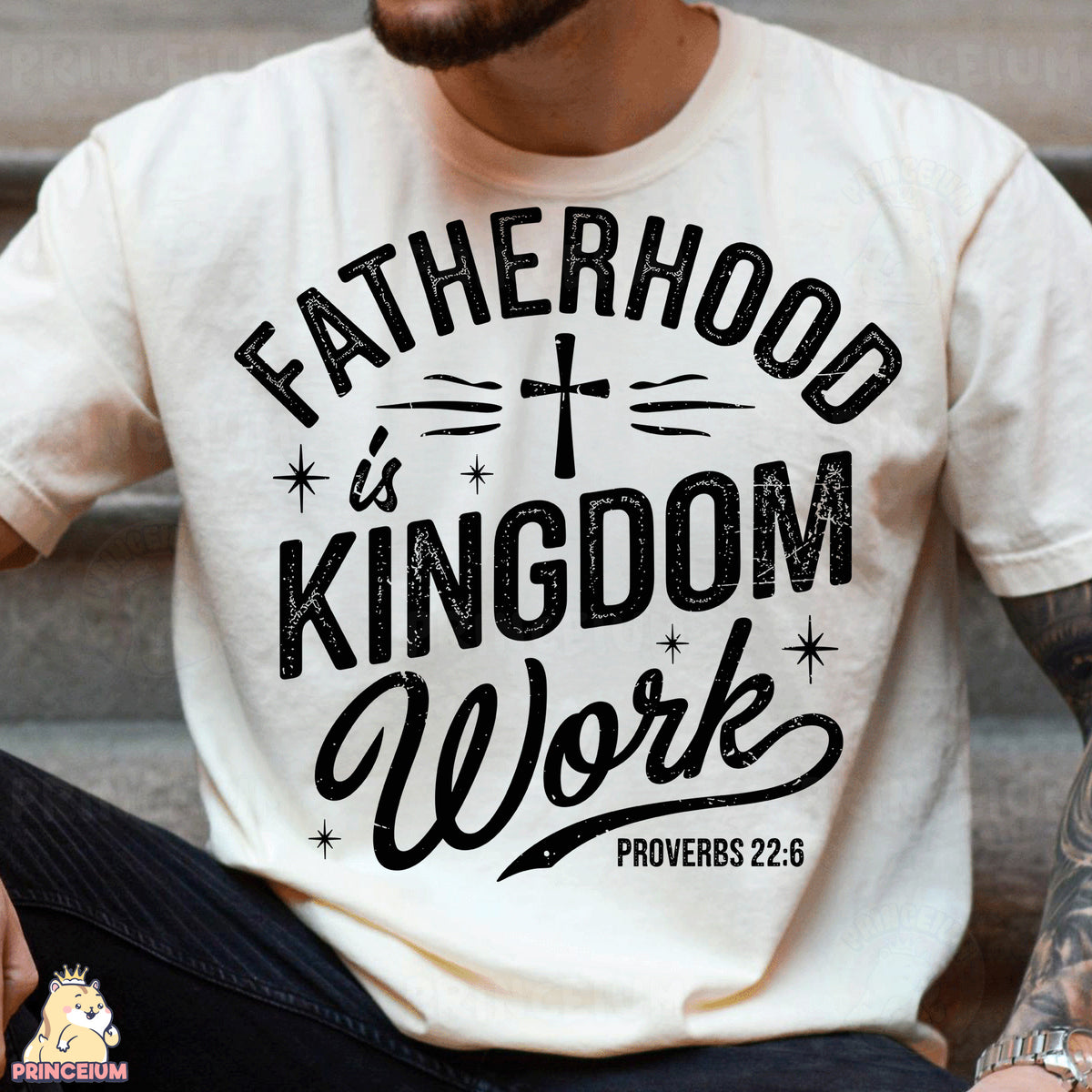 a man wearing a t - shirt that says fatherhood is kingdom work