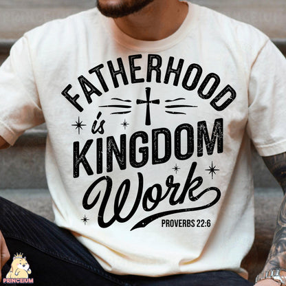 a man wearing a t - shirt that says fatherhood is kingdom work