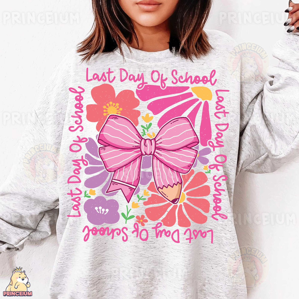 a woman wearing a sweatshirt with a pink bow on it