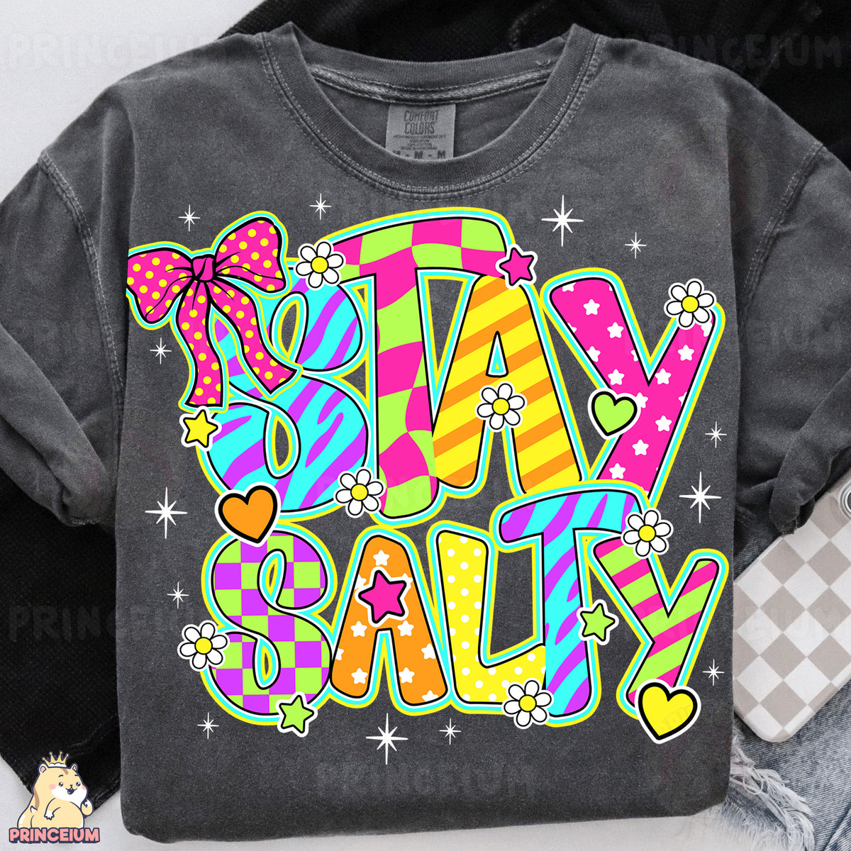 a t - shirt with the words stay salty on it