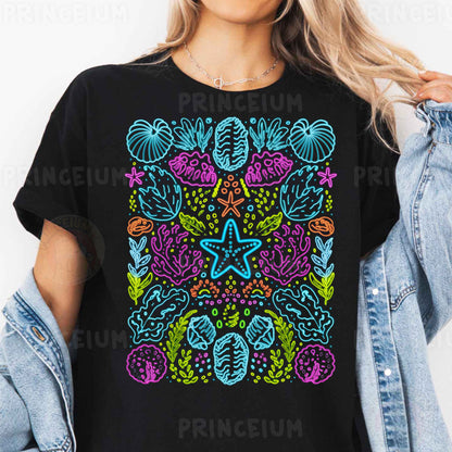a woman wearing a black t - shirt with a colorful design