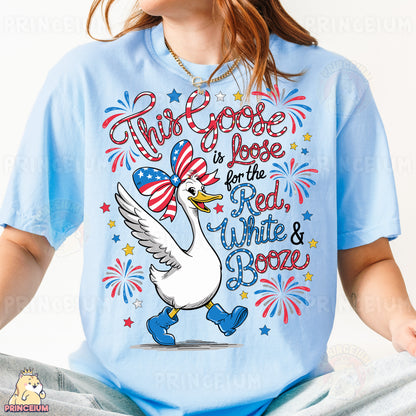 a woman wearing a blue shirt with a white goose on it