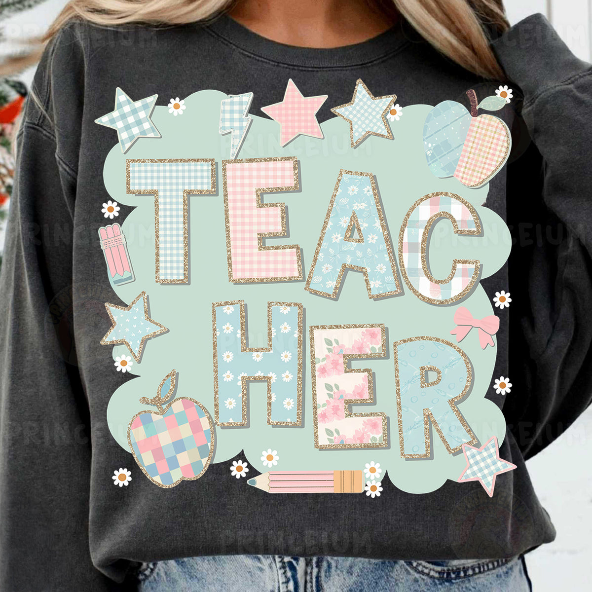 a woman wearing a sweatshirt that says teac cheer