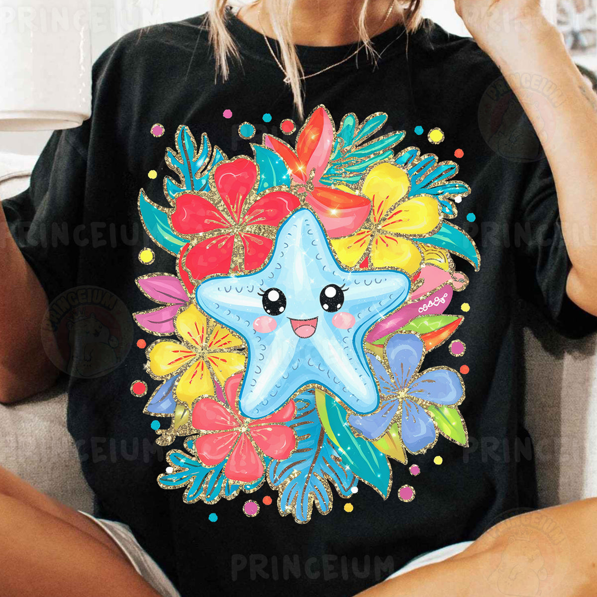 a woman sitting on a couch wearing a starfish t - shirt