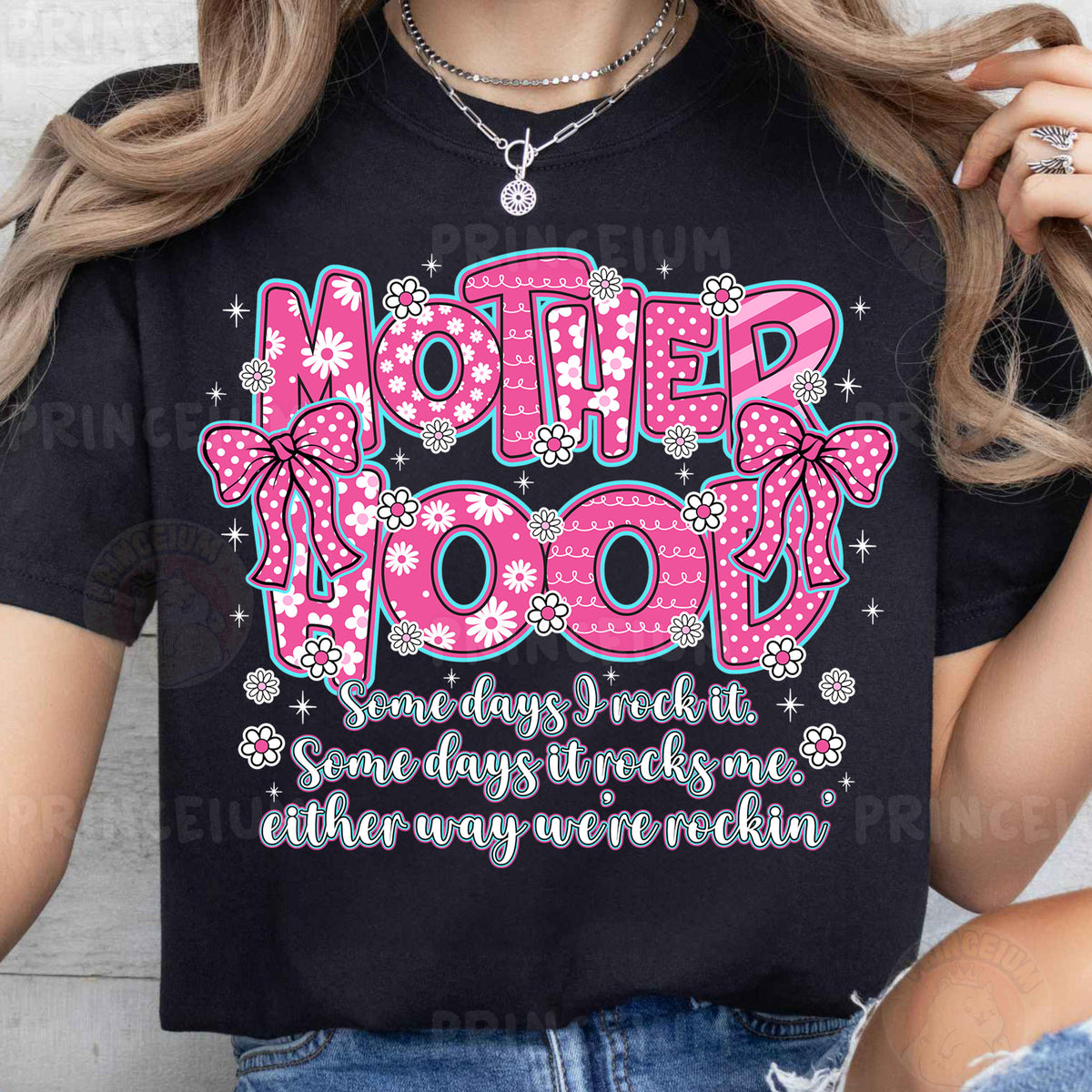 a woman wearing a t - shirt that says mother moon