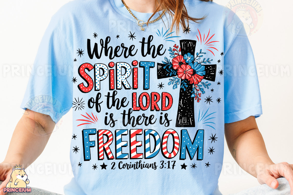a woman wearing a blue shirt with a cross on it