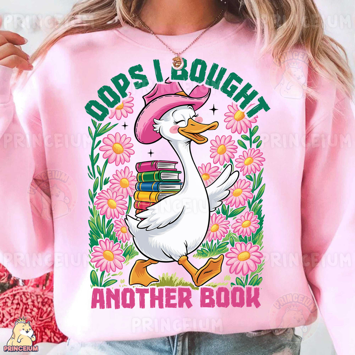 a woman wearing a pink sweatshirt with a duck wearing a pink hat