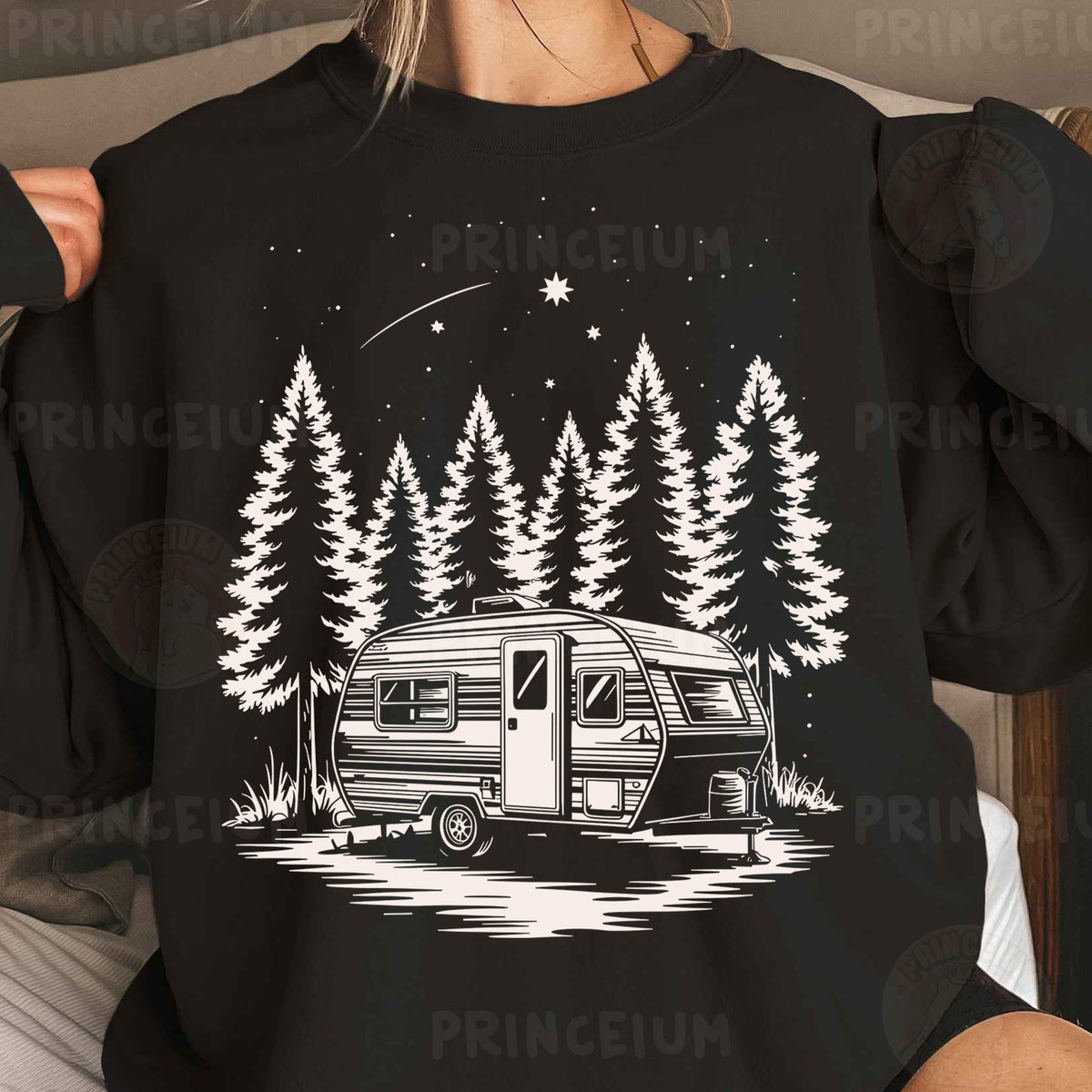 a woman wearing a black shirt with a camper on it