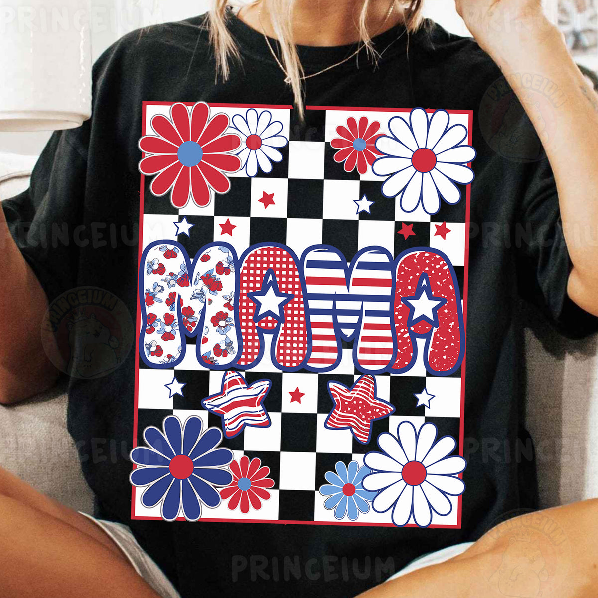 a woman sitting on a couch wearing a black shirt with red, white and blue