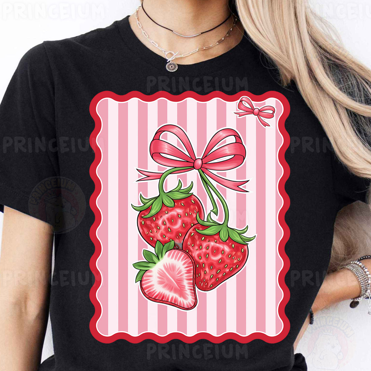 a woman wearing a black shirt with a strawberry on it