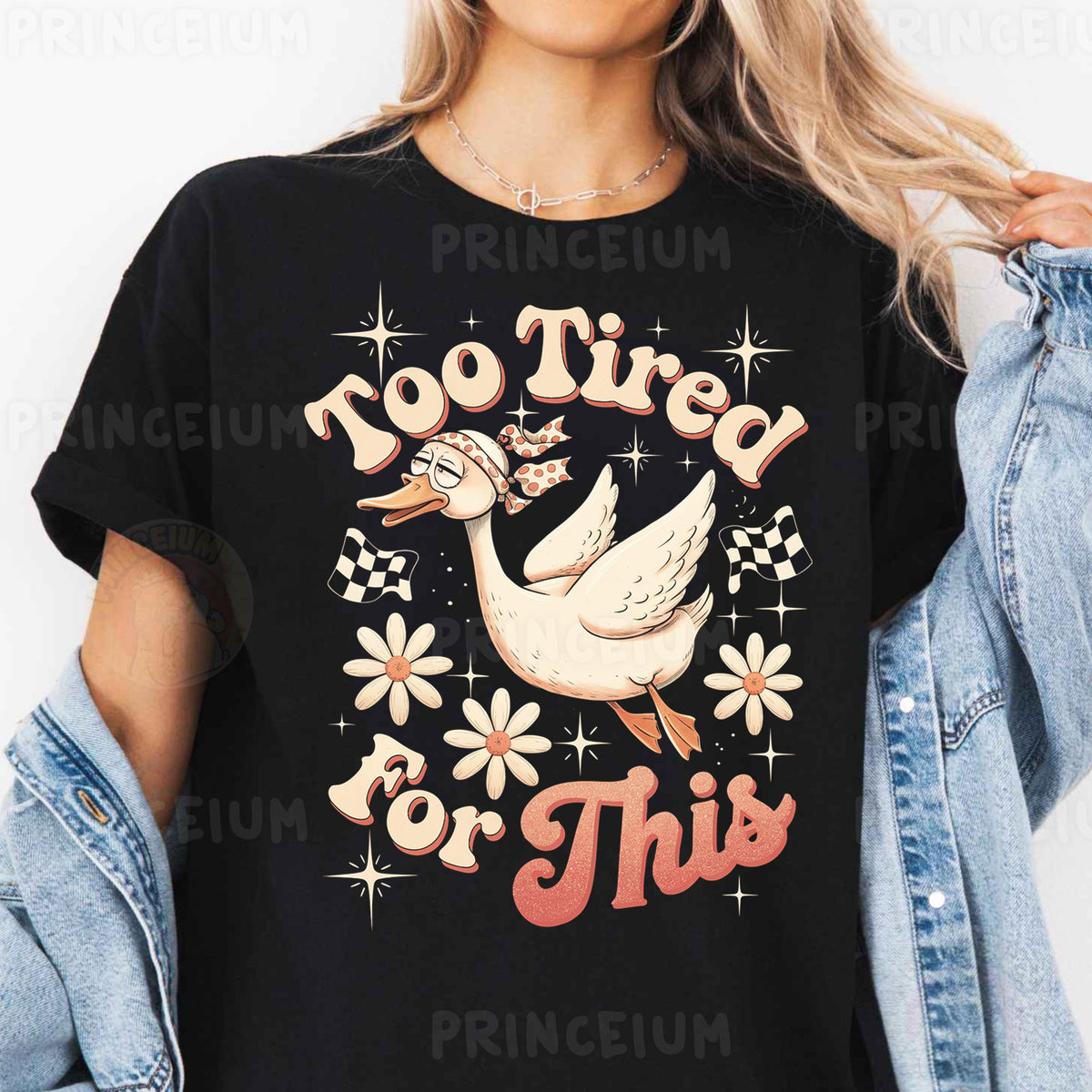 a woman wearing a black t - shirt with a white duck on it