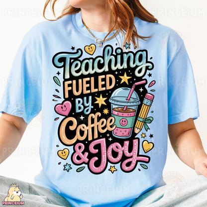 a woman wearing a blue shirt that says teaching fueled by coffee and joy