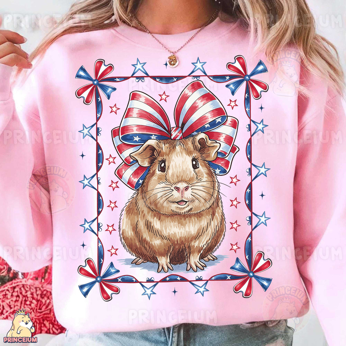 a woman wearing a pink sweatshirt with a picture of a guinea pig on it
