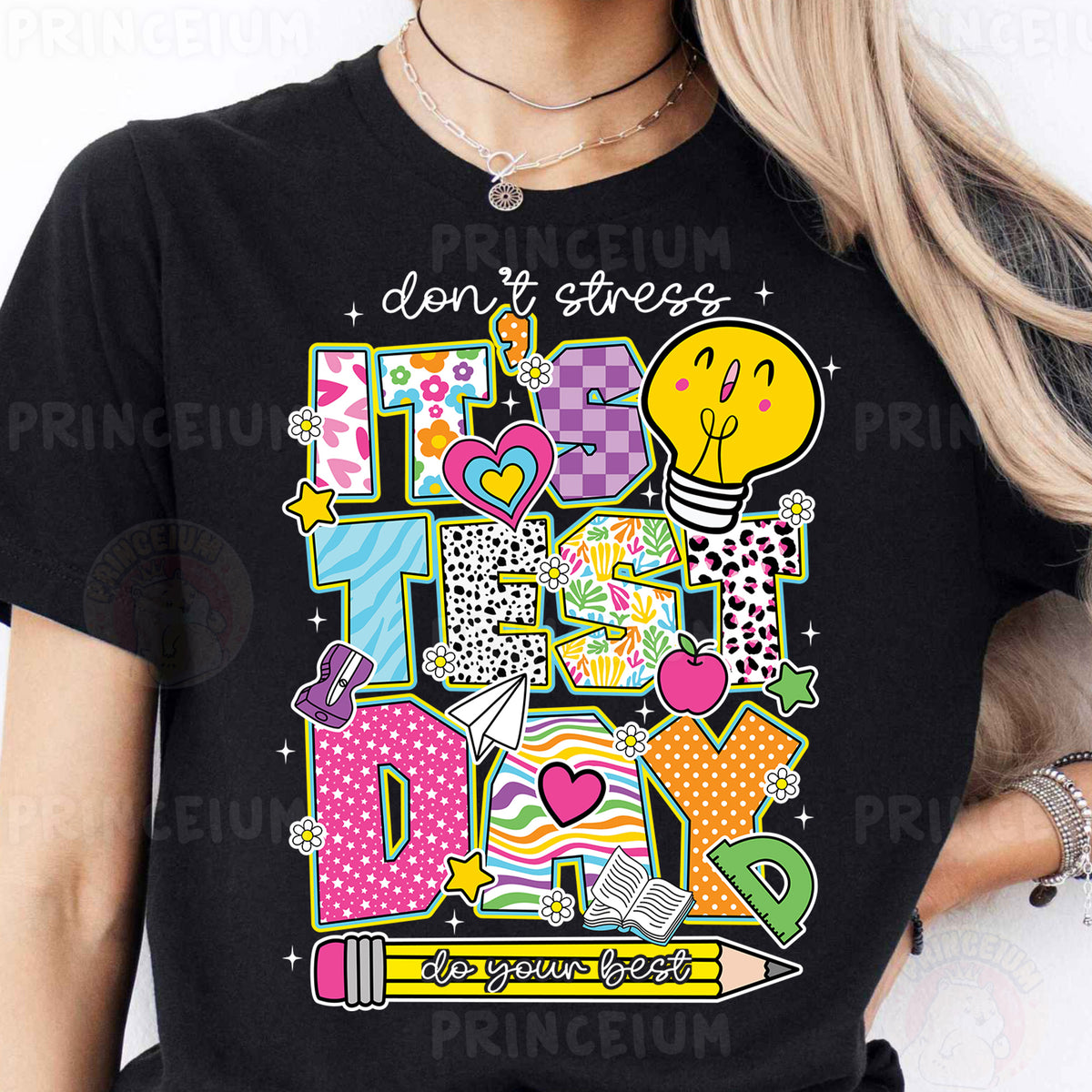 a woman wearing a black t - shirt with the words don't stress on