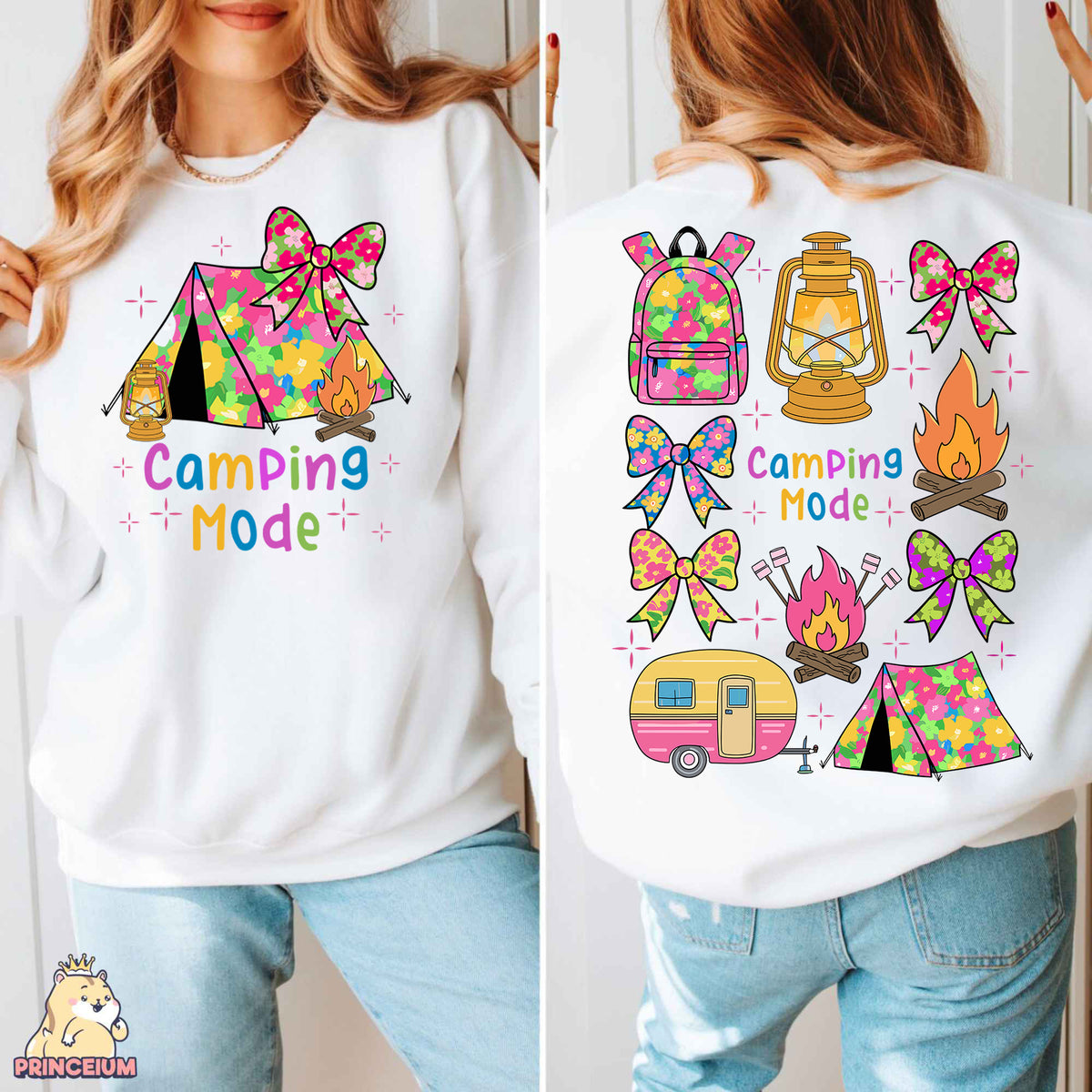 a woman wearing a camping mode sweatshirt and jeans