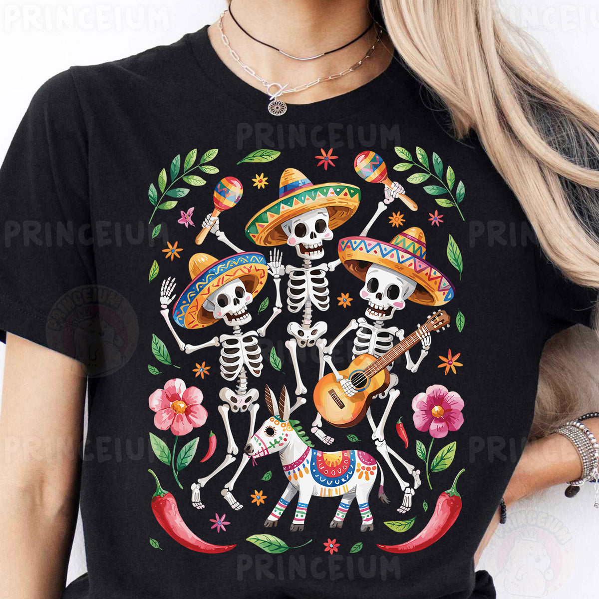 a woman wearing a black t - shirt with a mexican skeleton design
