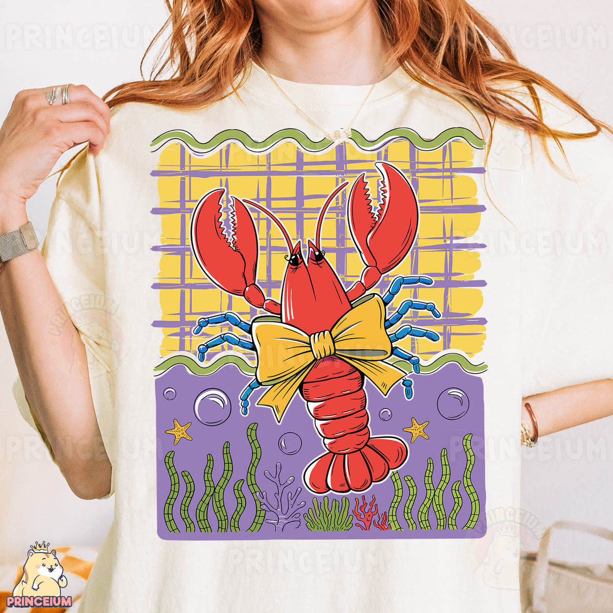 a woman wearing a t - shirt with a lobster on it