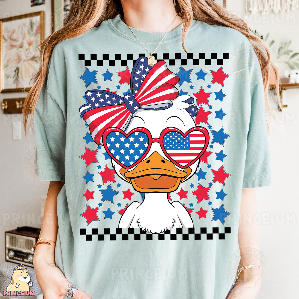 a woman wearing a t - shirt with a duck wearing sunglasses