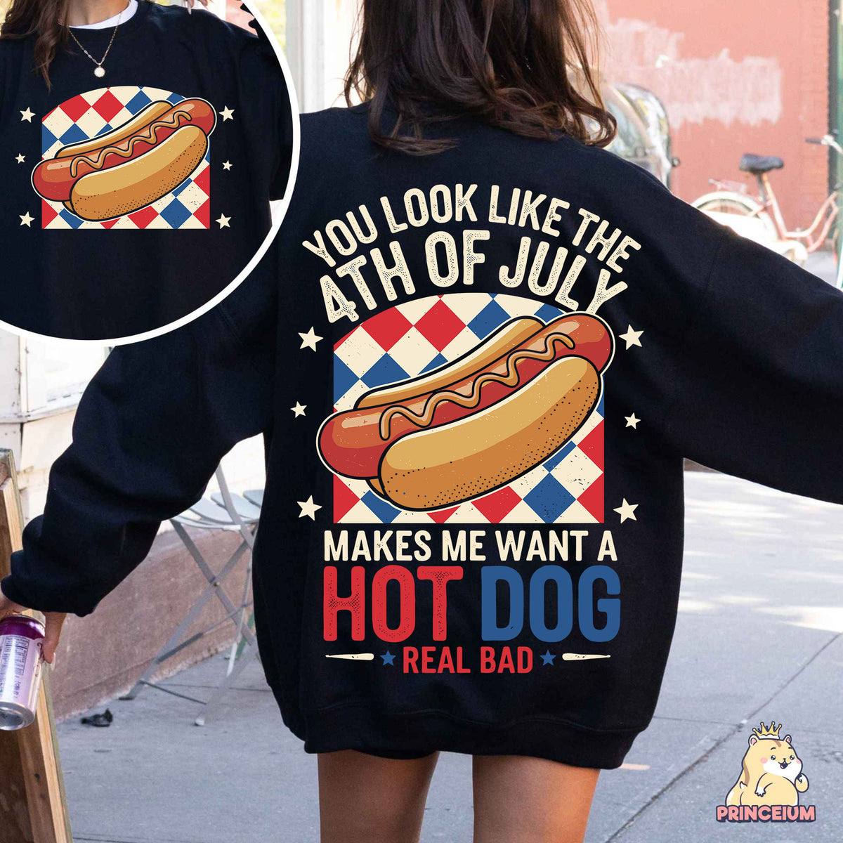a woman wearing a sweatshirt with a hot dog on it