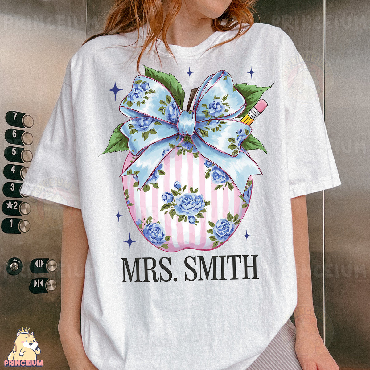 a woman wearing a t - shirt with a bow on it