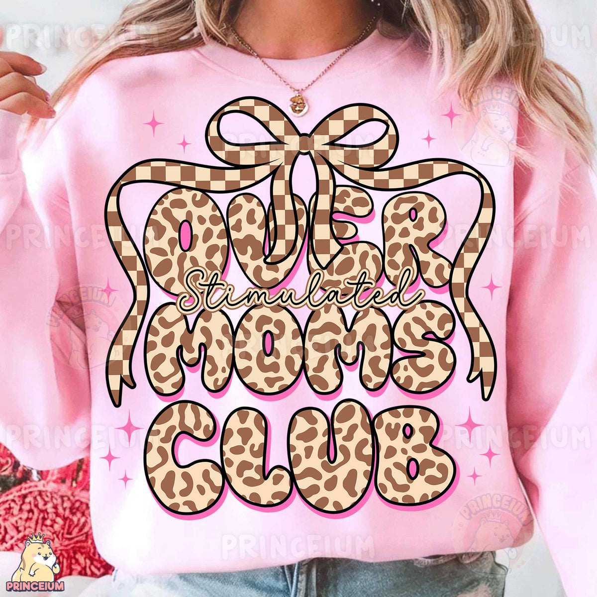 a woman wearing a pink sweatshirt with a leopard print