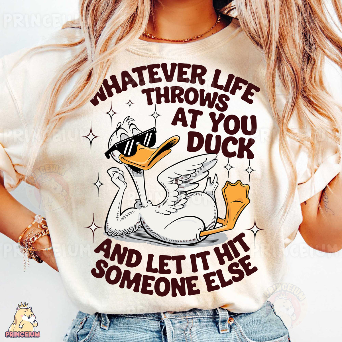 a woman wearing a t - shirt that says whatever life throws at you duck and