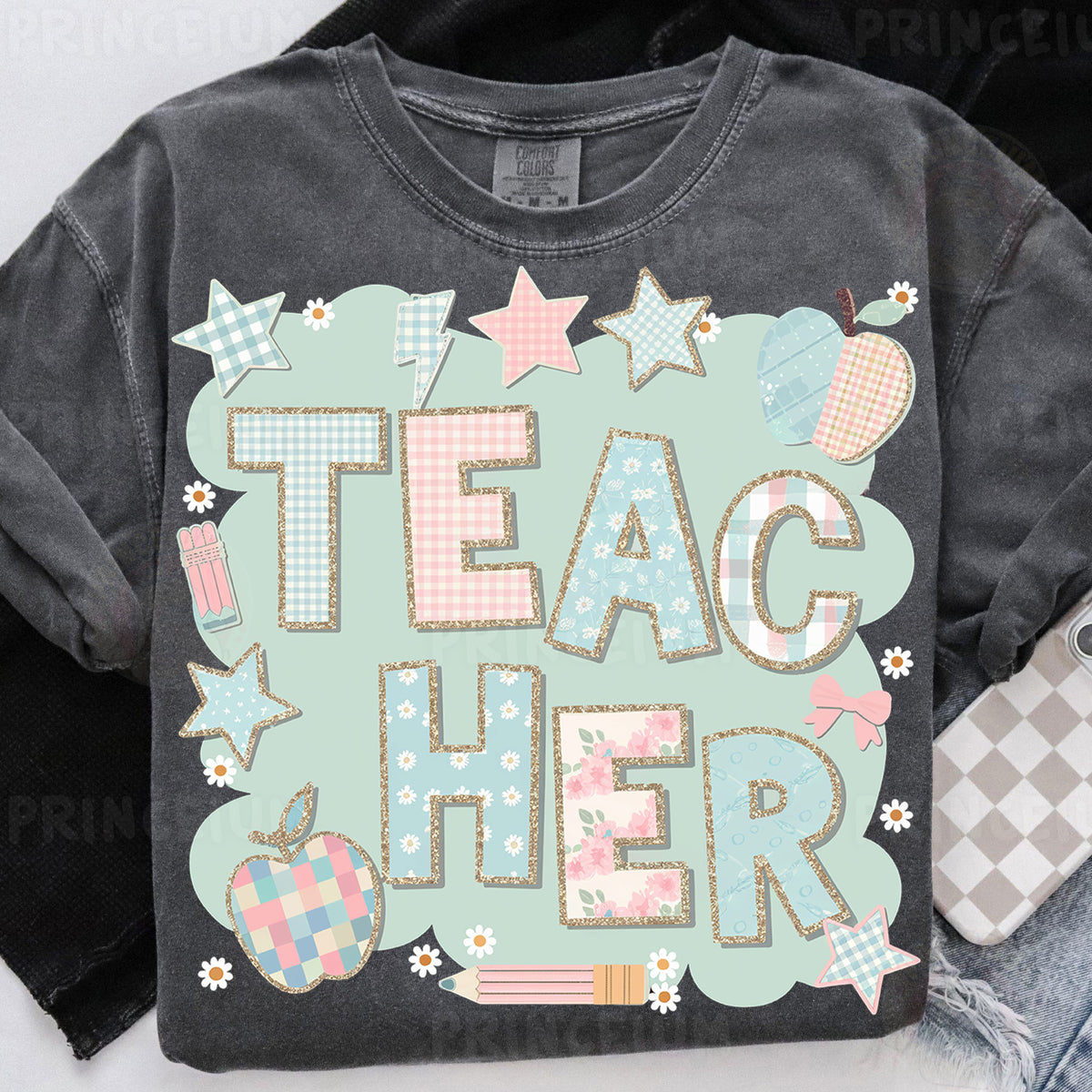 a t - shirt with the words teac her on it