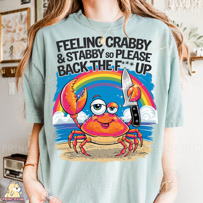 a woman wearing a t - shirt that says feeling crabby and stabby to