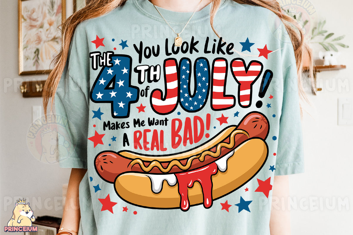 a woman wearing a t - shirt with a hot dog on it