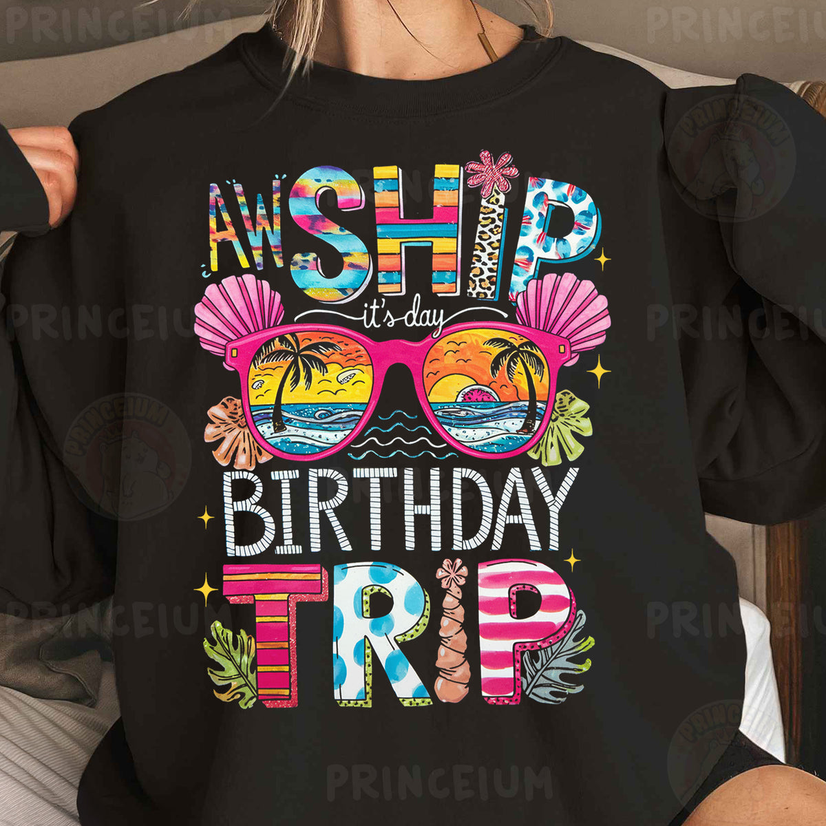 a woman wearing a black shirt that says, wish it's a birthday trip
