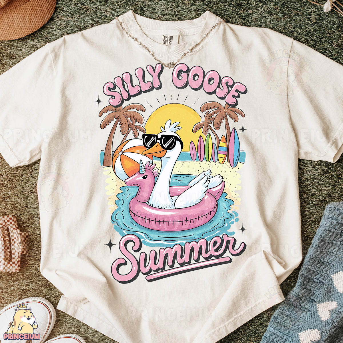 a white t - shirt with a flamingo on it