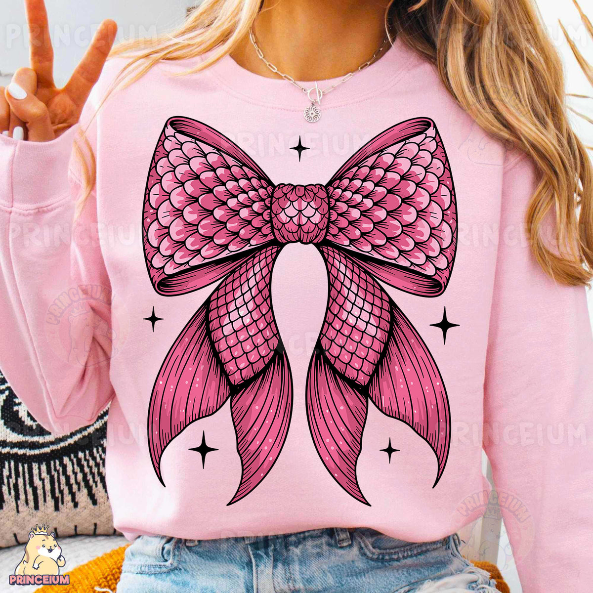 a woman wearing a pink shirt with a pink bow on it