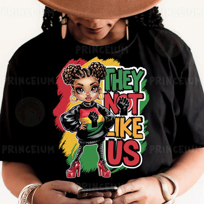 a woman wearing a black t - shirt that says they not like us