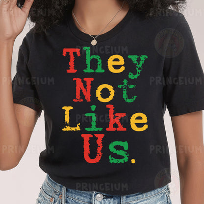 a woman wearing a t - shirt that says they not like us
