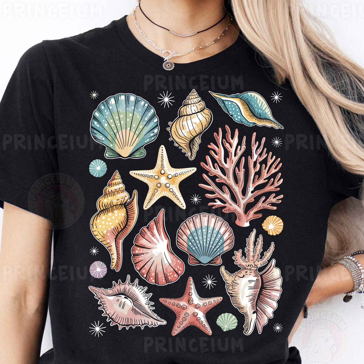 a woman wearing a black t - shirt with colorful seashells and starfish