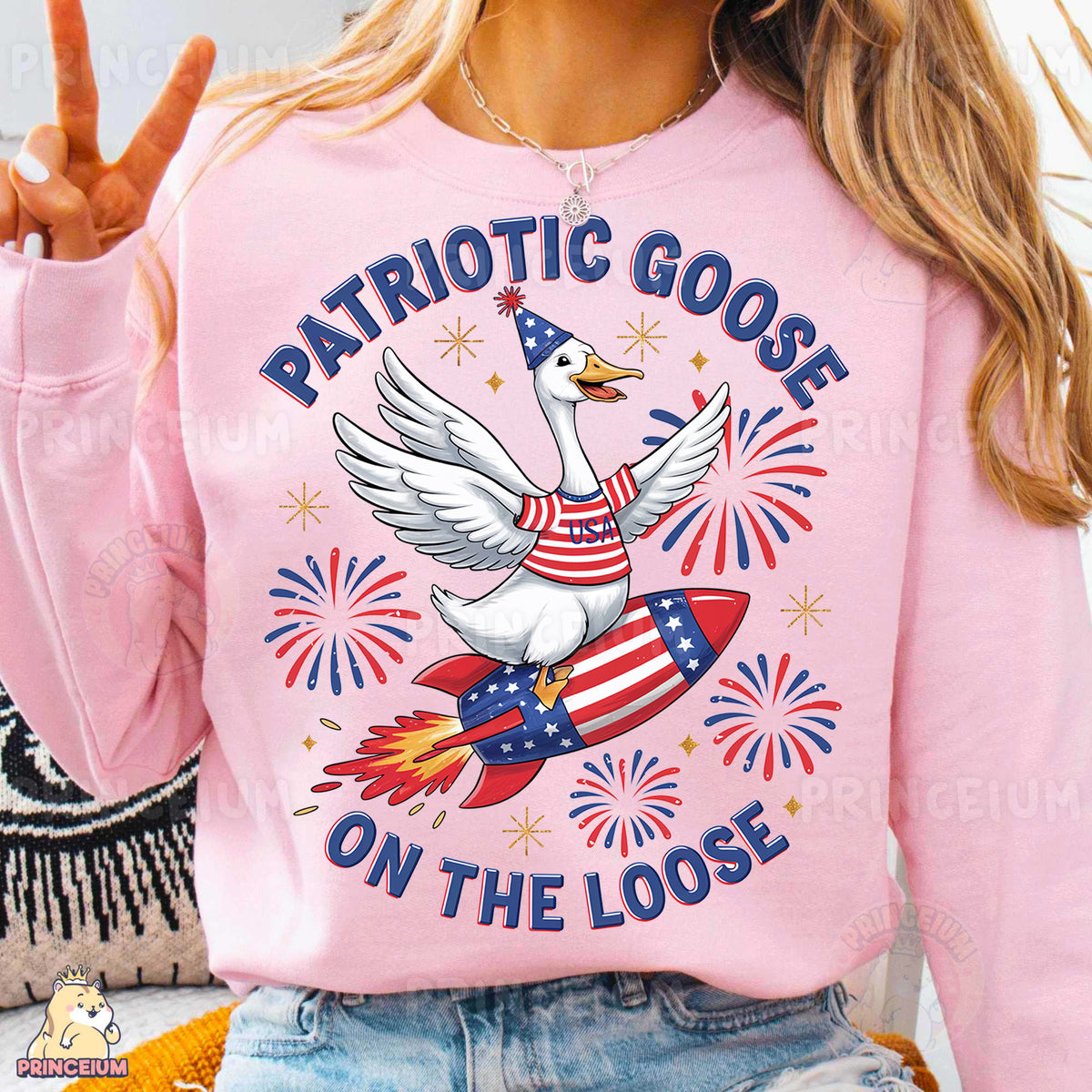 a woman wearing a patriotic goose on the loose shirt