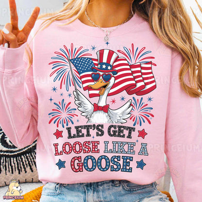 a woman wearing a pink sweatshirt with an american flag on it