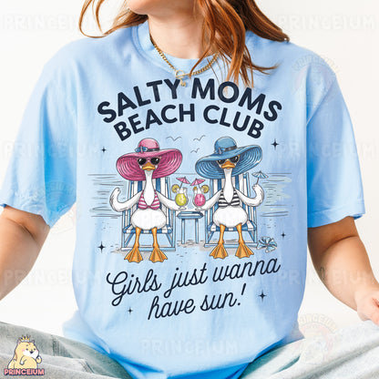 a woman wearing a t - shirt that says salty moms beach club