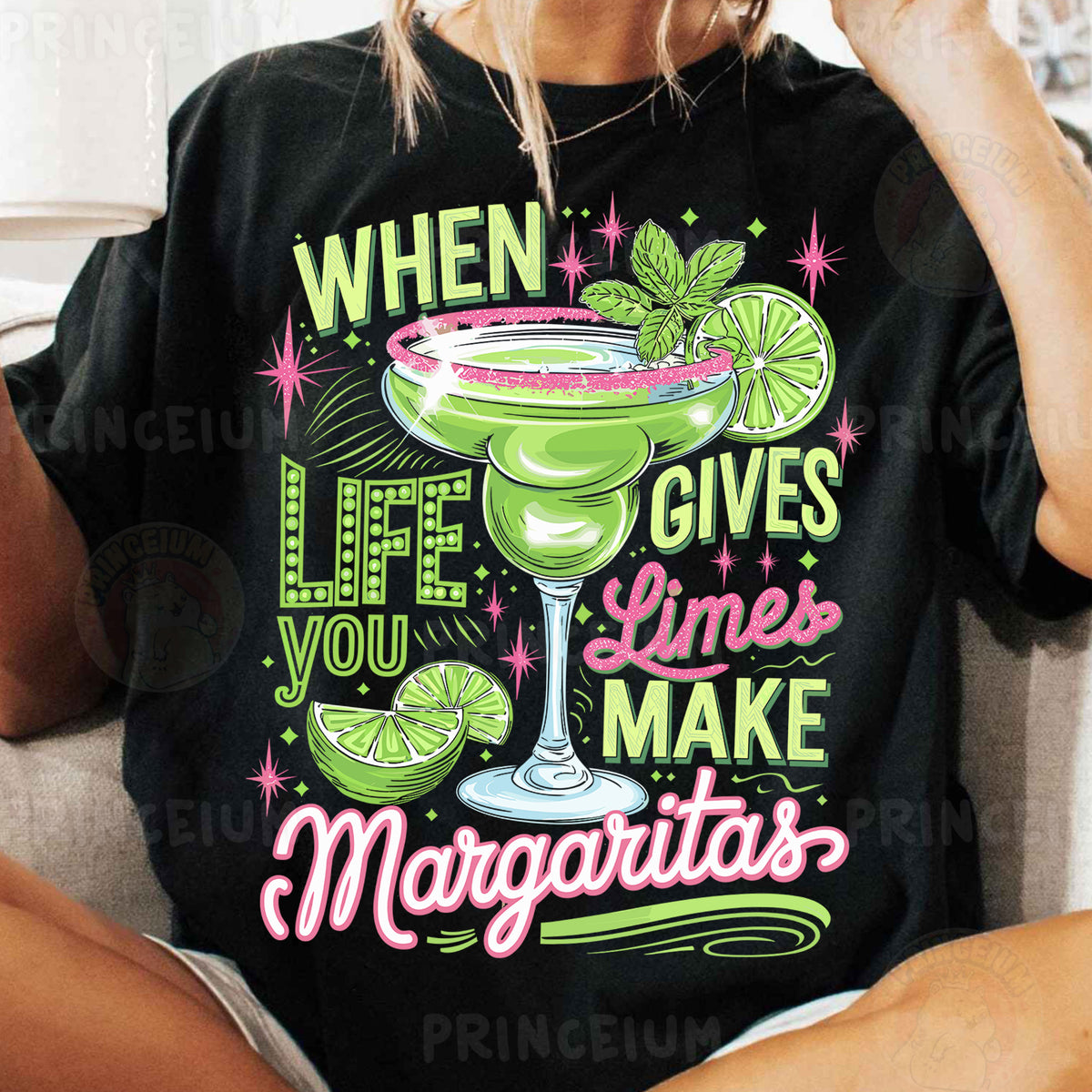 a woman sitting on a couch wearing a t - shirt that says when life gives