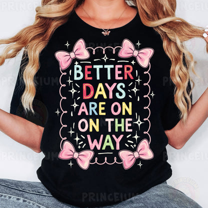 a woman wearing a t - shirt that says better days are on the way