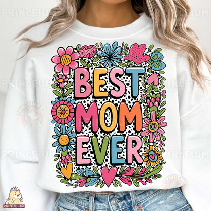 a woman wearing a sweatshirt that says best mom ever