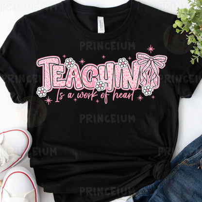 a t - shirt that says teaching is a work of heart