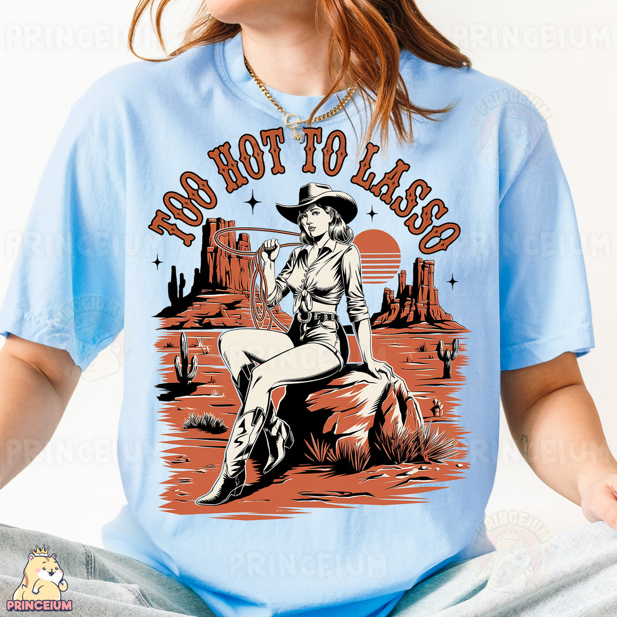 a woman wearing a blue shirt with a cowboy on it